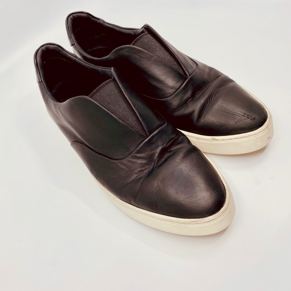 Vince black leather slip on sneakers